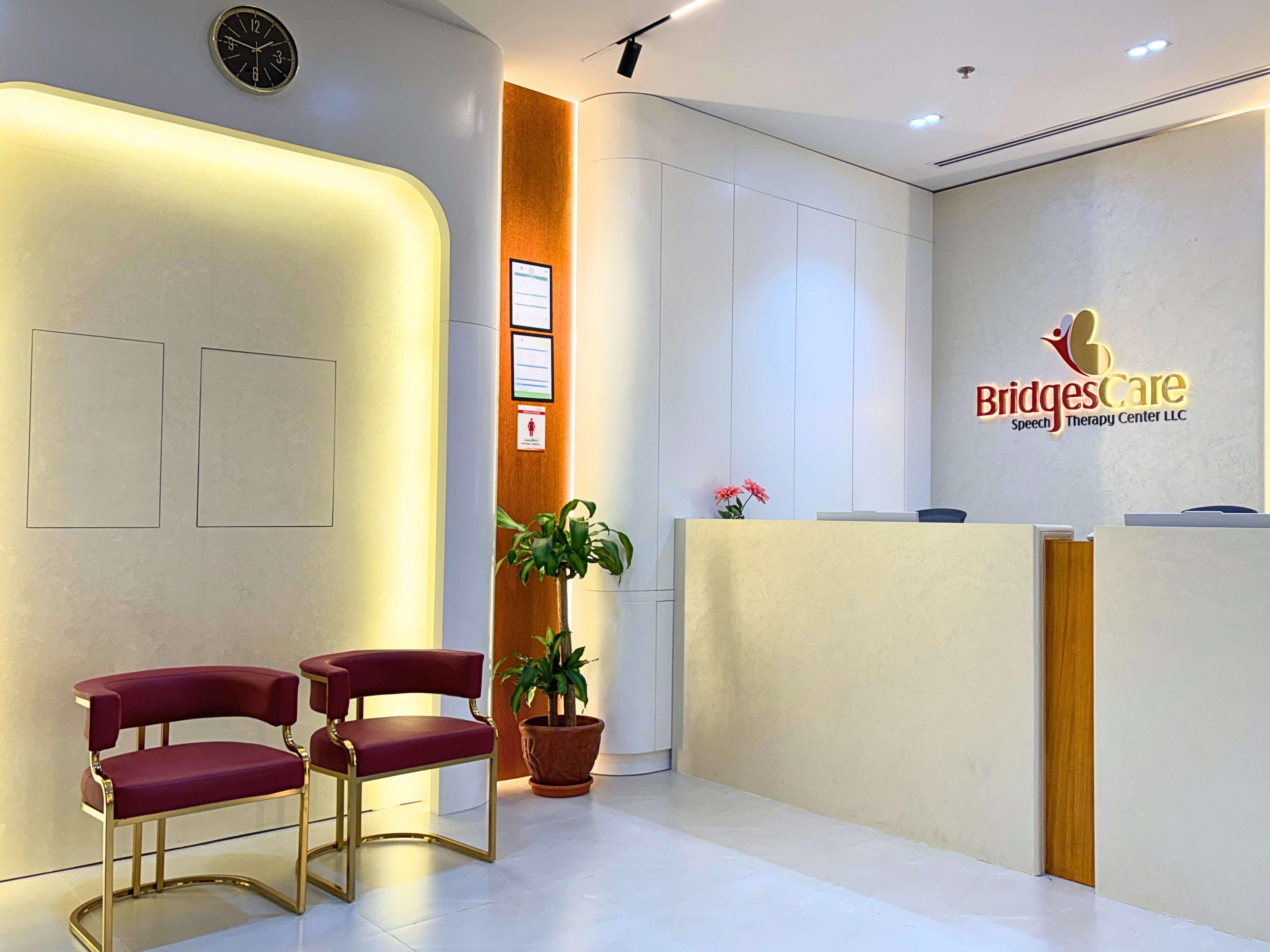 Reception and waiting area at Bridges Care Speech Therapy Center - warm, modern, family-friendly clinic in Dubai Investment Park
